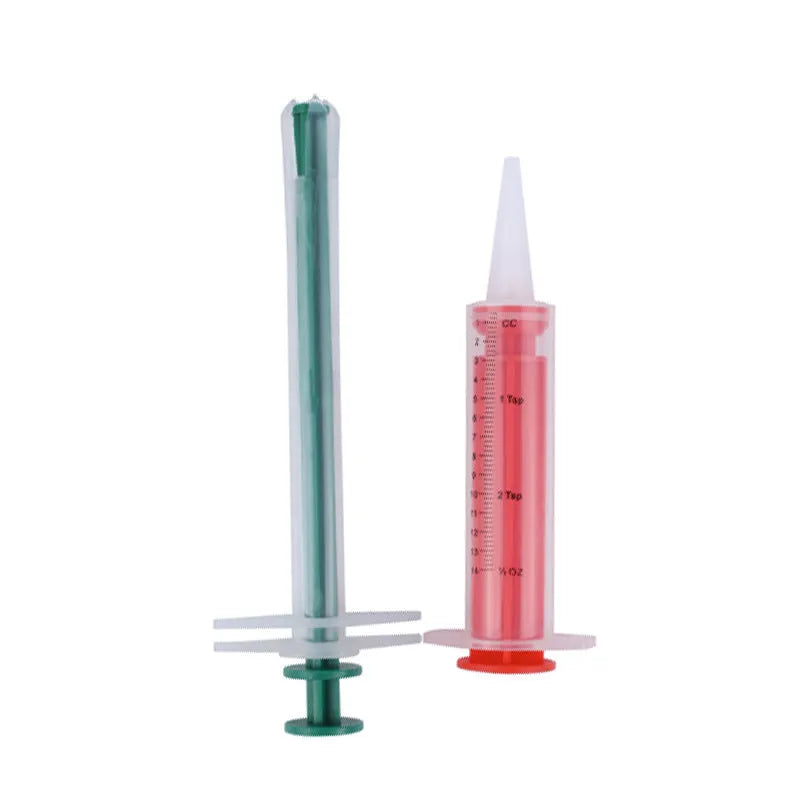 Two silicone pet pill shooters, one larger and one smaller, with soft tips and push rods.