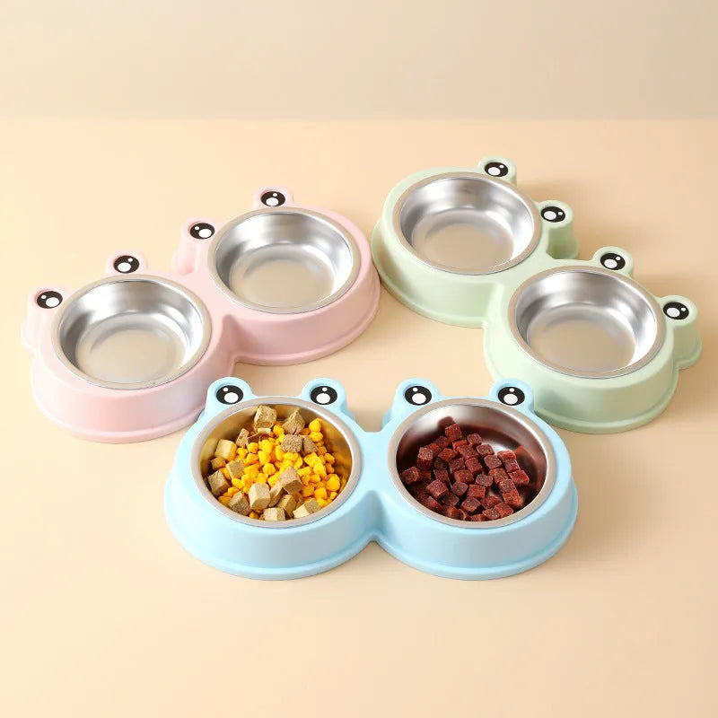Stainless steel pet double bowl with frog design showing separate food and water compartments