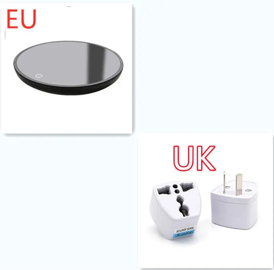 Black dual-temperature coffee mug warmer with low/high switch on a desk.