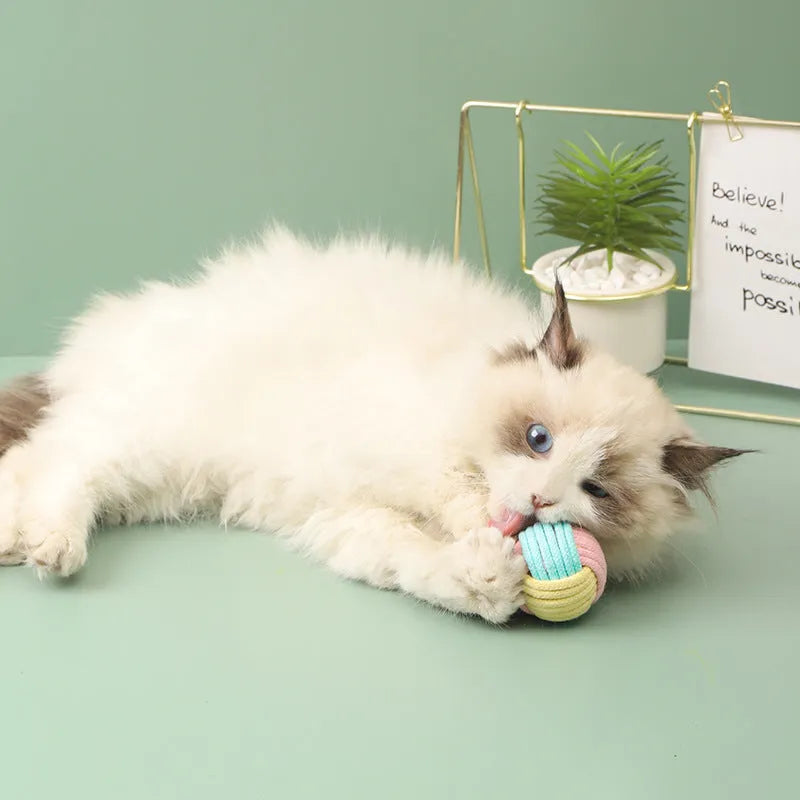 Handmade blue powder, green blue, and pink green cotton plush cat hair ball toy, 5cm in diameter.