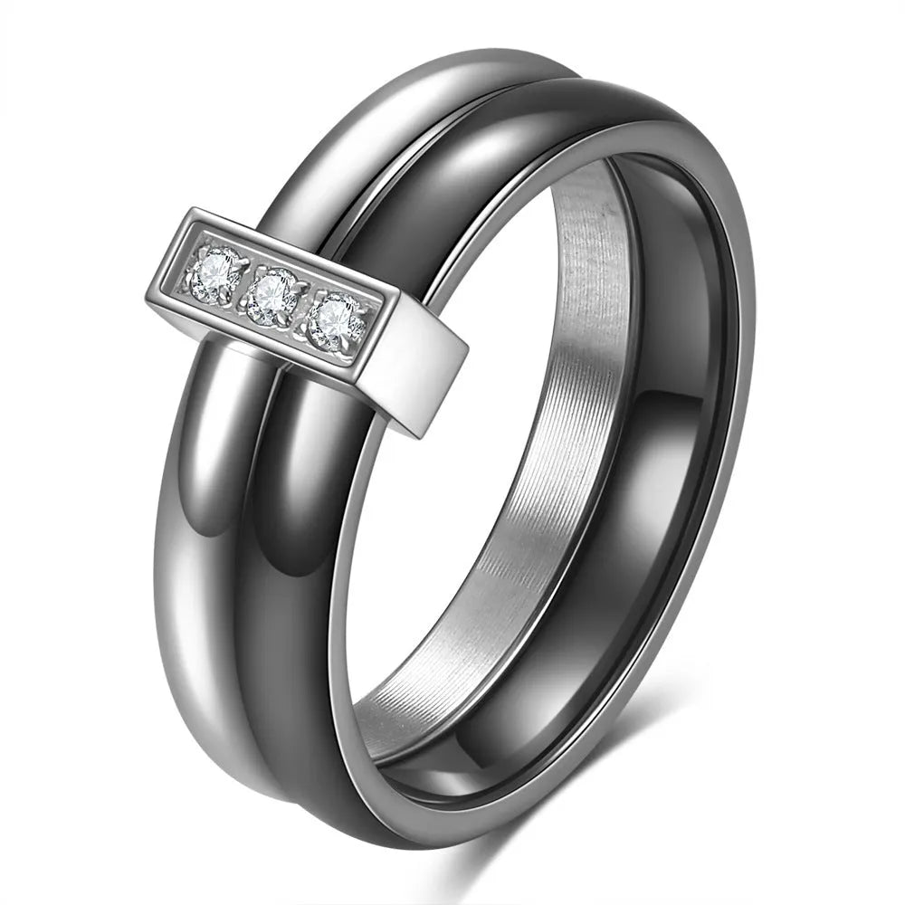 Geometric ceramic women's ring with zirconium detailing in steel black or gold white finish