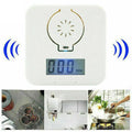 White carbon monoxide alarm for wall mounting with wireless communication and audible alarm