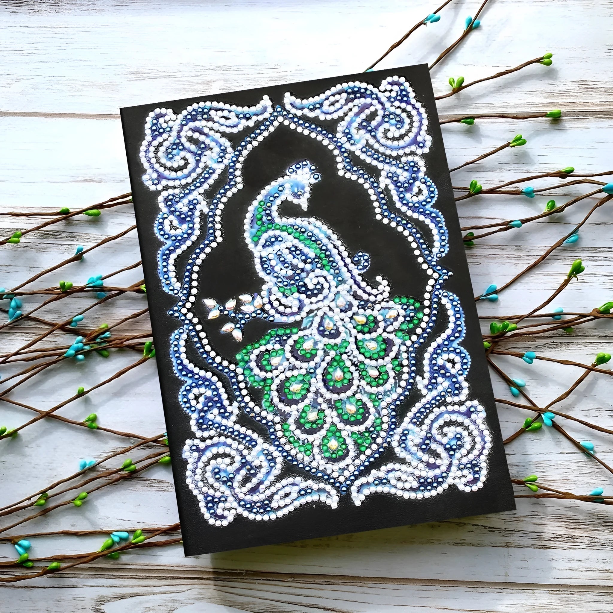 A5 black diamond painting notebook with peacock design using shaped and bright drill techniques