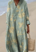 Women's long floral shirt dress with 3D printed pattern and wide waist.