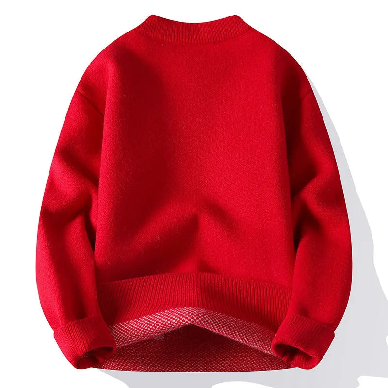 Men's loose grey knitted pullover with ribbed hemline on a hanger