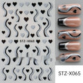 Sheet of nail art stickers with black and silver stripes and a love heart pattern.
