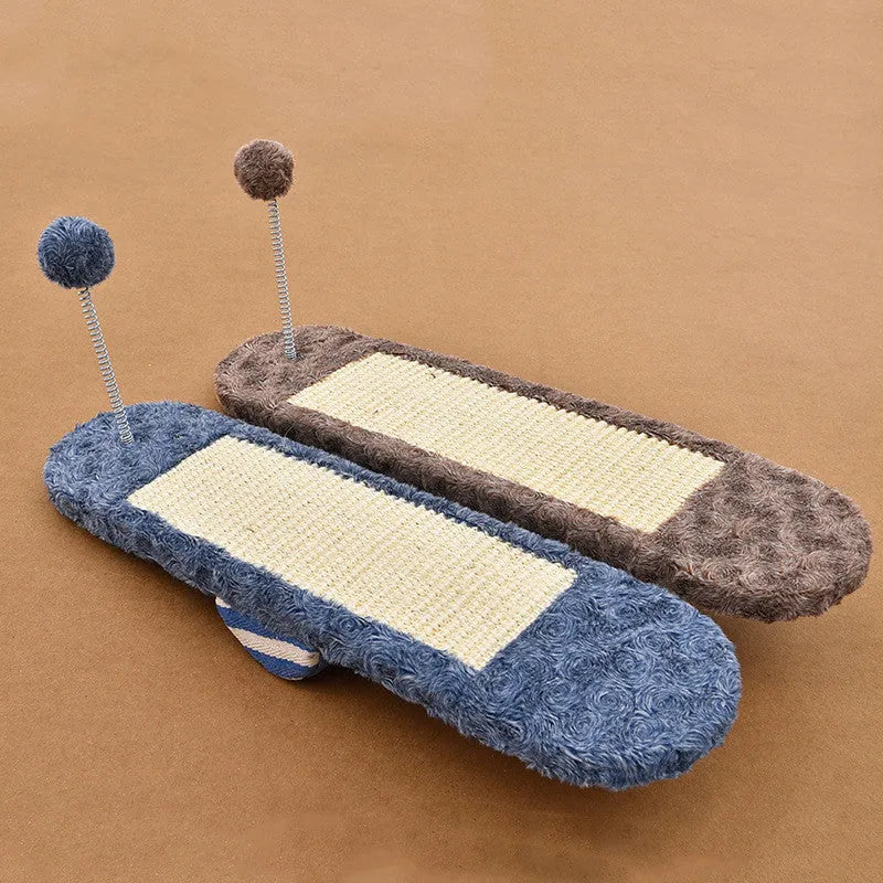 Royal blue cat seesaw toy with scratch board surface on a light background