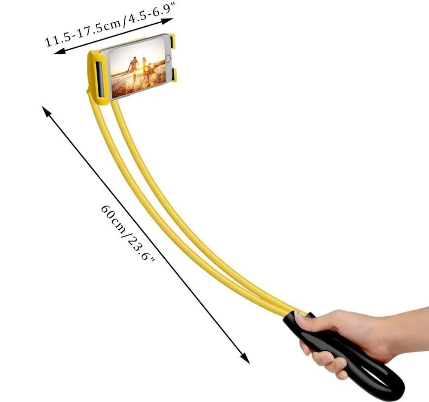 White universal phone holder rotating to show 360-degree movement on a desk.
