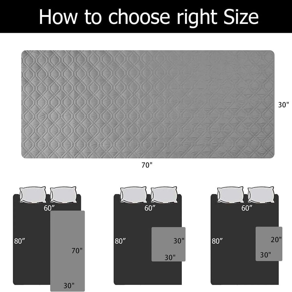 Reversible dog blanket couch cover in grey, laid flat on a sofa