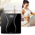 Black electronic household body scale with tempered glass platform and digital display