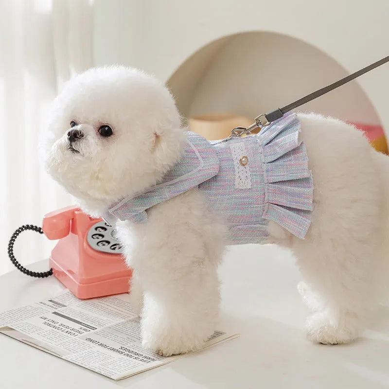 Purple and pink lightweight polyester clothing for a small dog or cat on a hanger.
