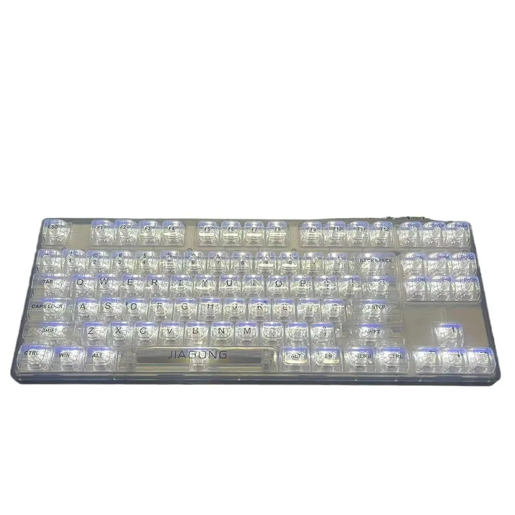 Full set of 132 transparent plastic key caps for mechanical keyboards laid out.