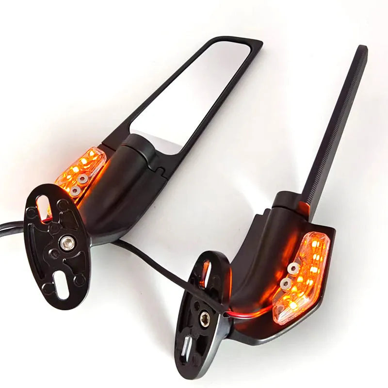 Pair of aluminium motorcycle spoiler rearview mirrors with convex glass lenses and integrated yellow running lights.