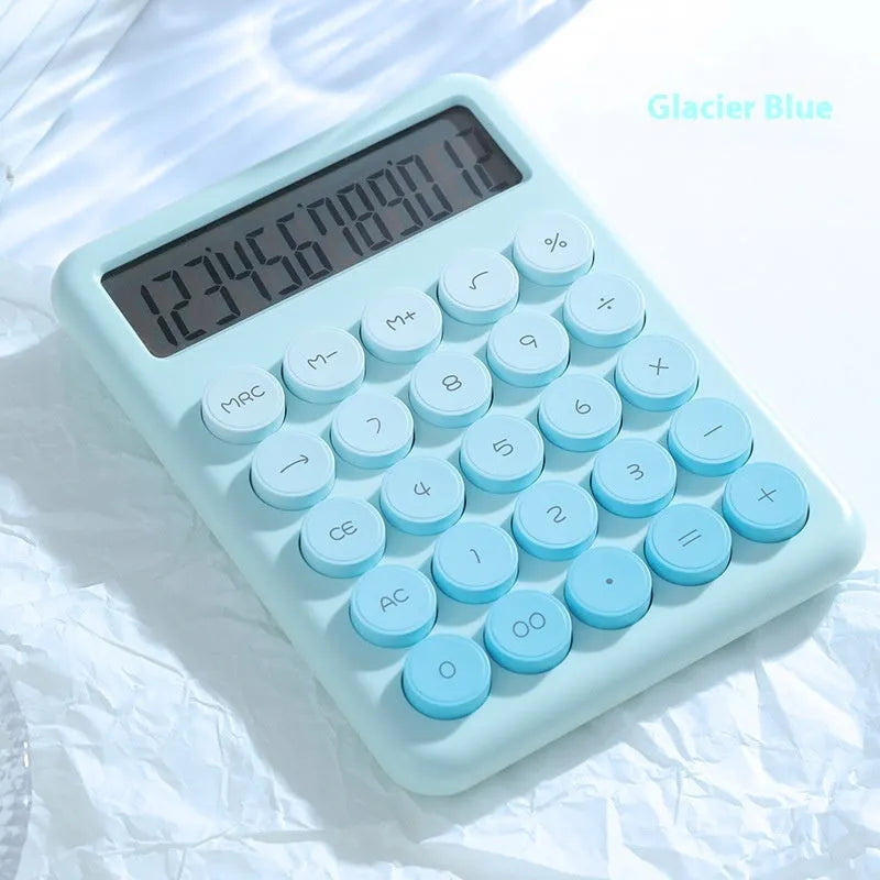 Gradient colour desktop calculator in four colour options on desk