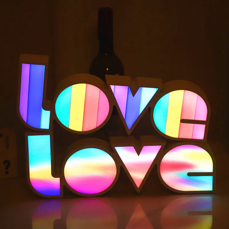 Rainbow style LED LOVE decorative light on a tabletop