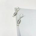Retro fishbone design alloy necklace and matching earrings set on a dark background.