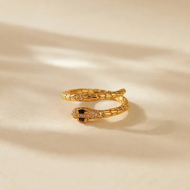 Snake-shaped adjustable index finger ring with gold colour finish and diamond-treated surface