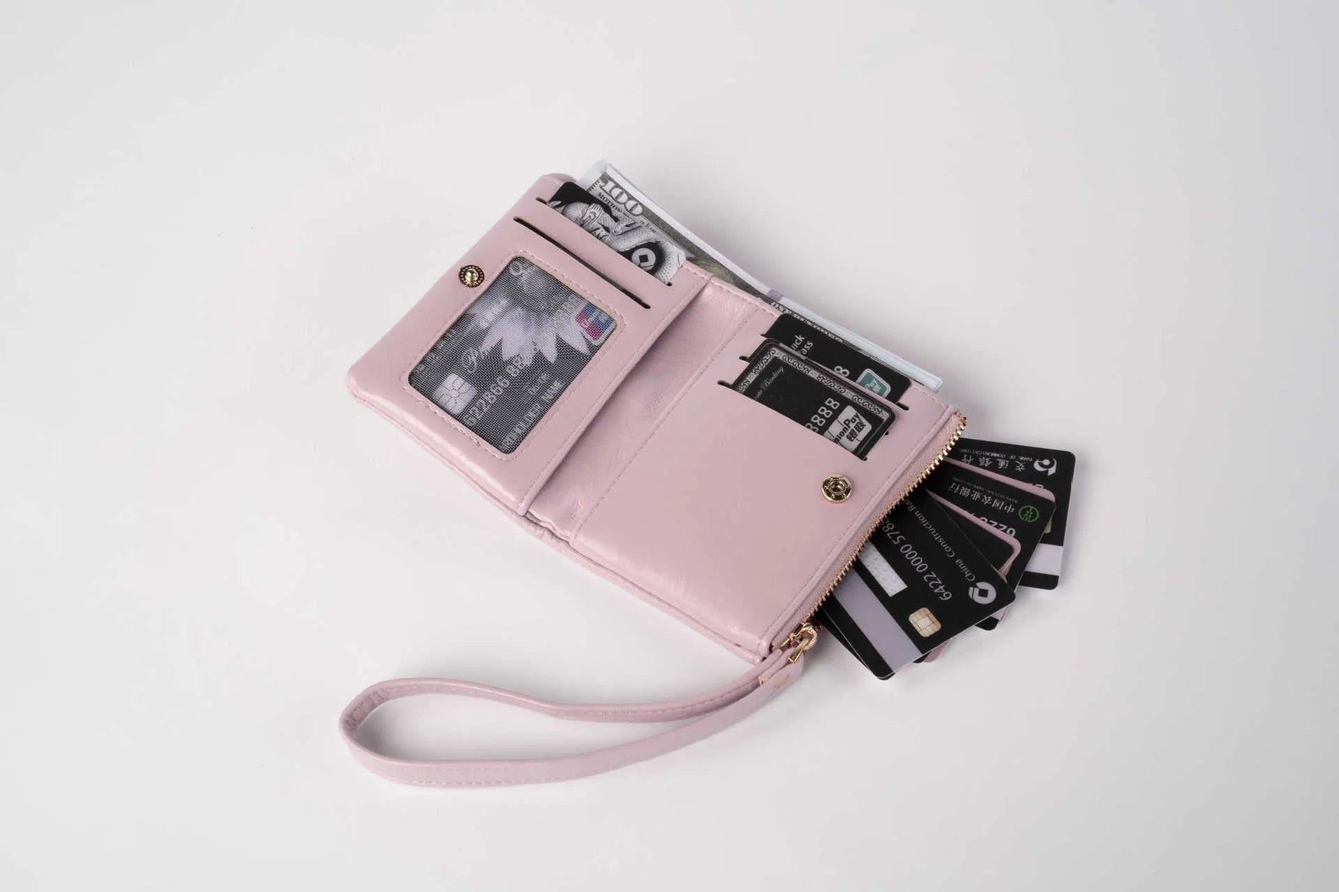 Women's short PU zipper wallet in khaki with stone pattern decorative element, compact design.