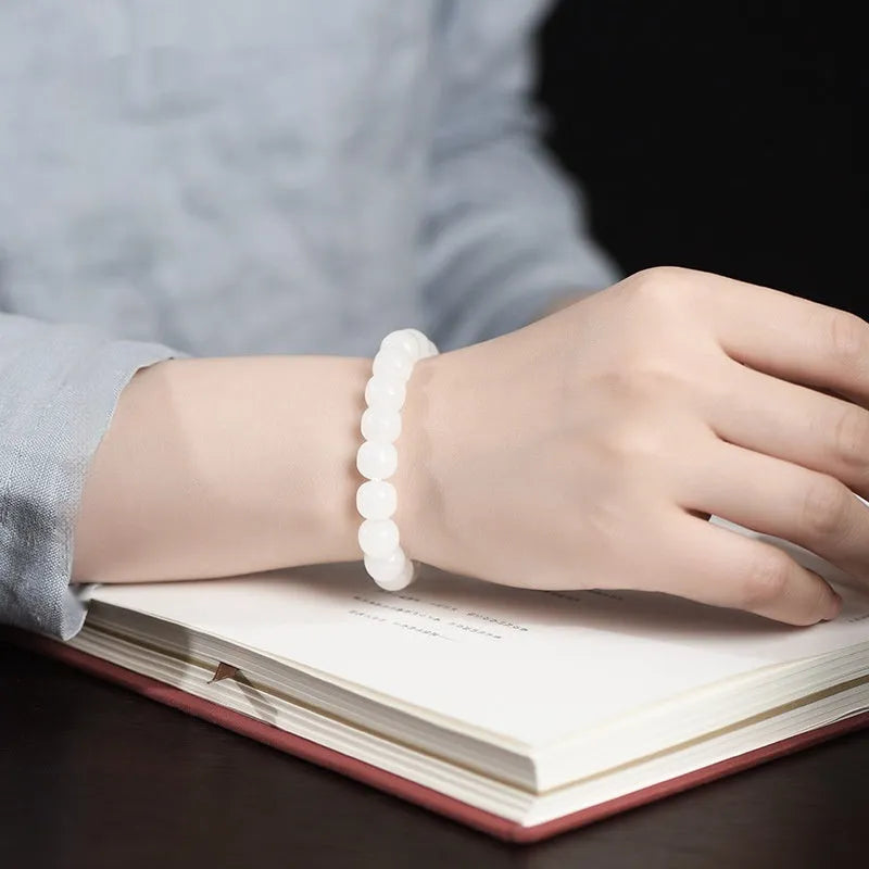 White jade barrel bead bracelet in Hetian jade showing three bead size options for men and women