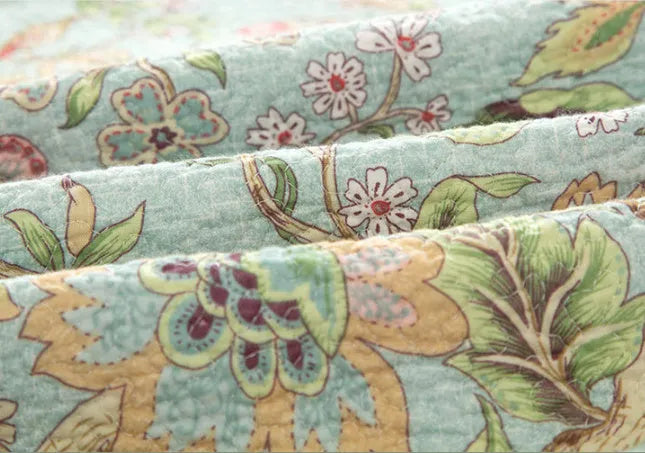 Blue American floral design cotton bedspread quilt set with three pieces showing plant and bird patterns