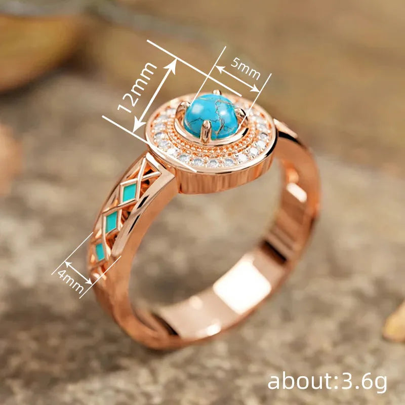 Rose gold geometric women's ring with turquoise inlaid zircon on a copper band.