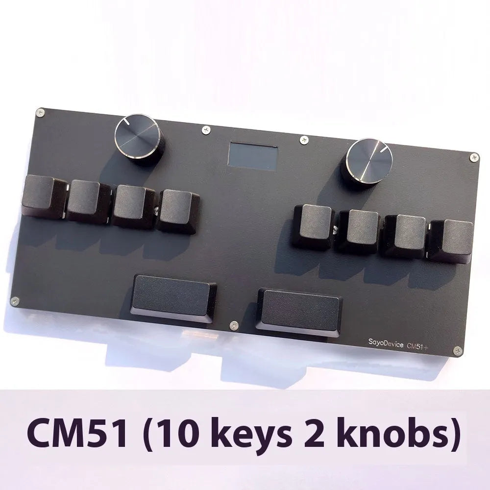 Customisable magnetic axis gaming keypad with programmable knob and colour IPS screen on desk.