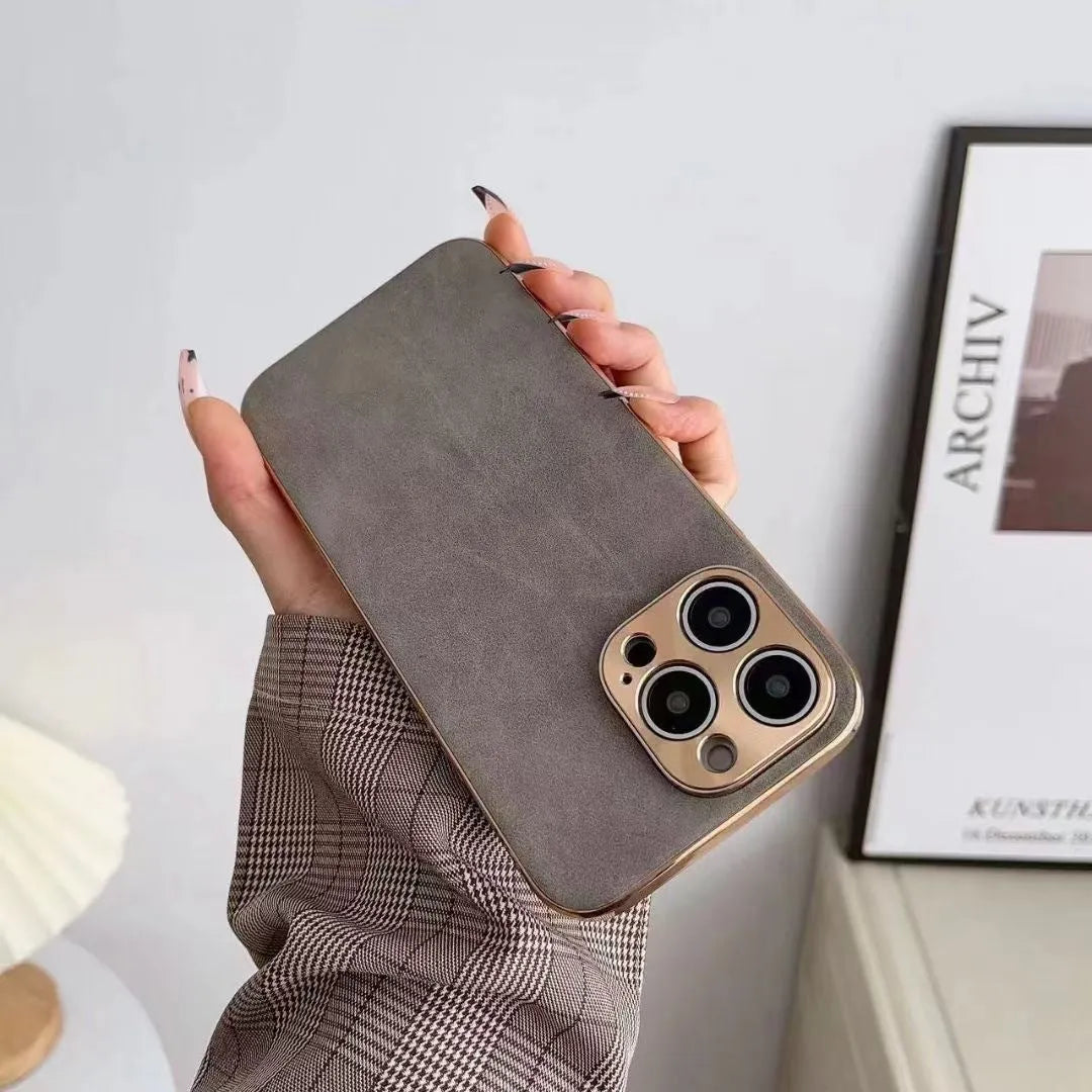 Leather texture TPU iPhone case in solid colours: black, blue, grey, grey-green for iPhone 11, 12, 13, 14 models.