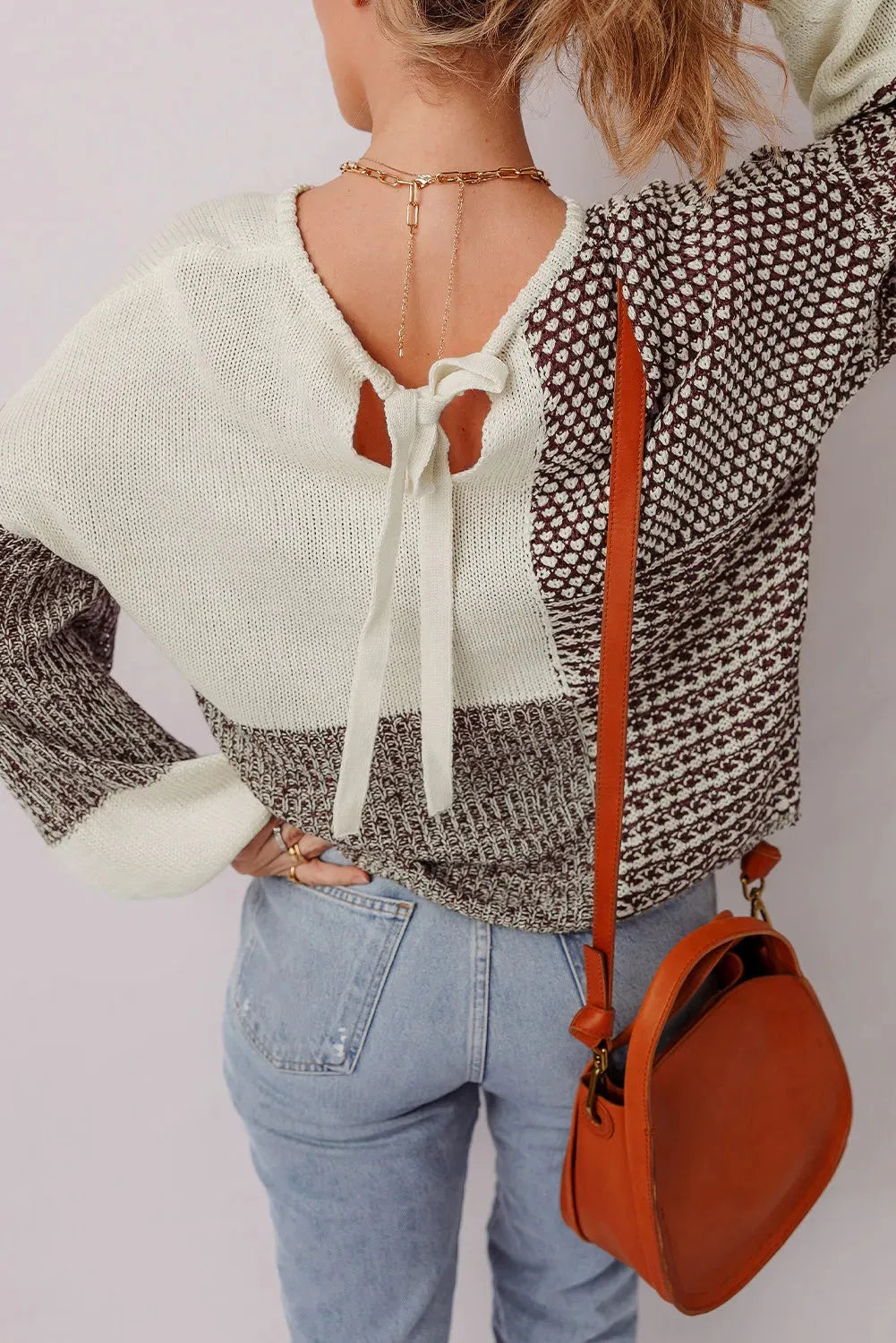 Dark khaki and black colour block loose sweater with drop shoulders and a back tie fastening.