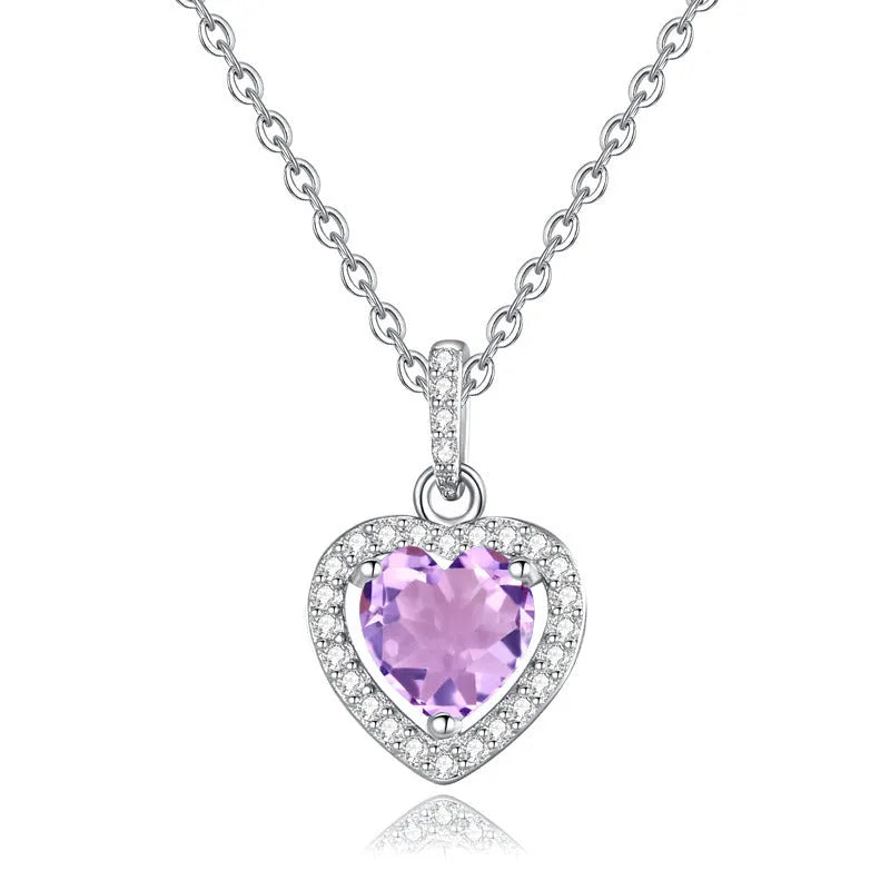 Women's sterling silver heart pendant necklace with natural coloured gemstone on cross chain