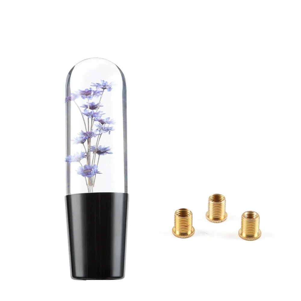 JDM crystal car gear knob with flower-in-water design, 15cm long, shown with three fitting adapters