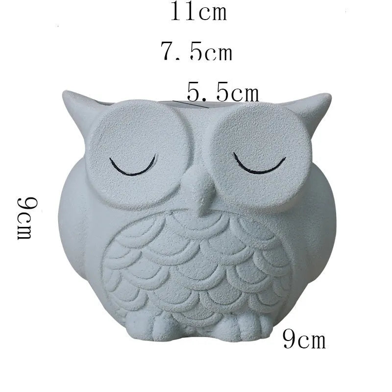 Handmade frosted ceramic owl flower pot in light pink for small succulents.