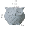 Handmade frosted ceramic owl flower pot in light pink for small succulents.