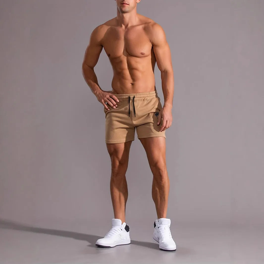 Men's khaki sports shorts with coconut print design and straight leg cut