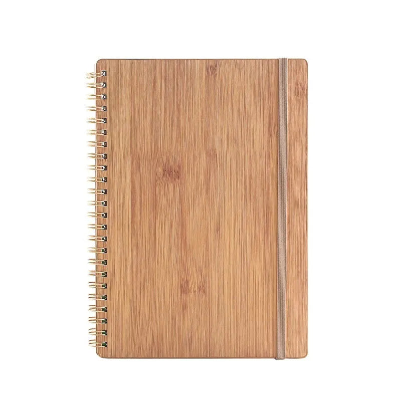 Erasable coil notebook with customisable cover options on waterproof rock stone paper, shown with pen.