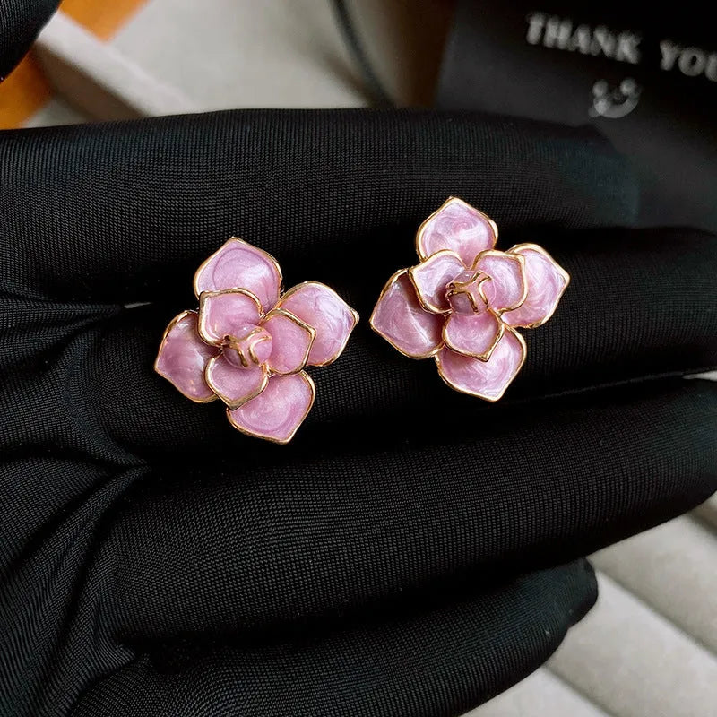 Gold-plated purple oil-spot glaze floral stud earrings with copper construction