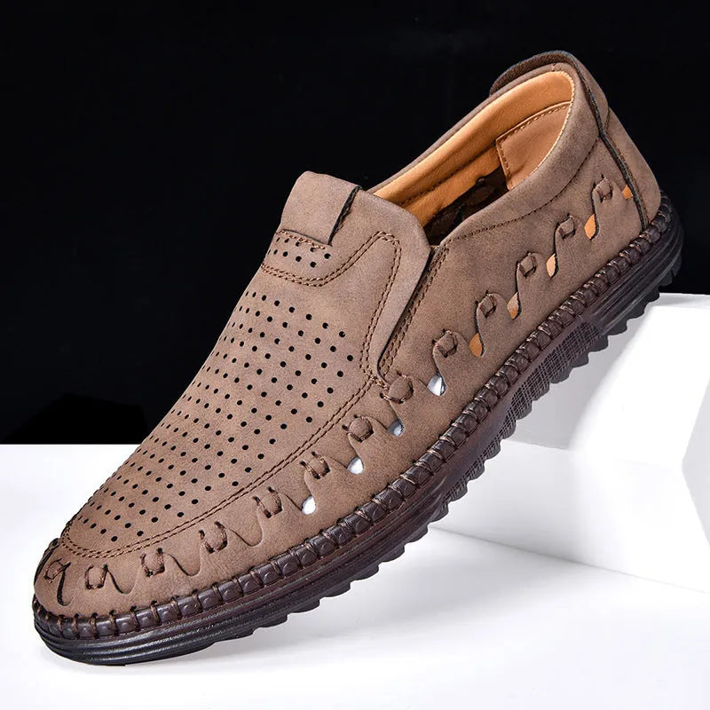 Men's brown casual slip-on leather shoes with round toe and flat sole.