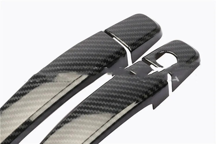 Carbon fibre pattern stick-on overlay for Opel Vauxhall Astra 2004-2015 interior door handle.