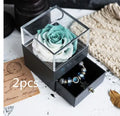 Eternal flower gift box with preserved roses and carnations in a 8.5x8.5x10.5 cm decorative display