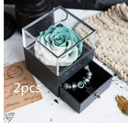 Eternal flower gift box with preserved roses and carnations in a 8.5x8.5x10.5 cm decorative display