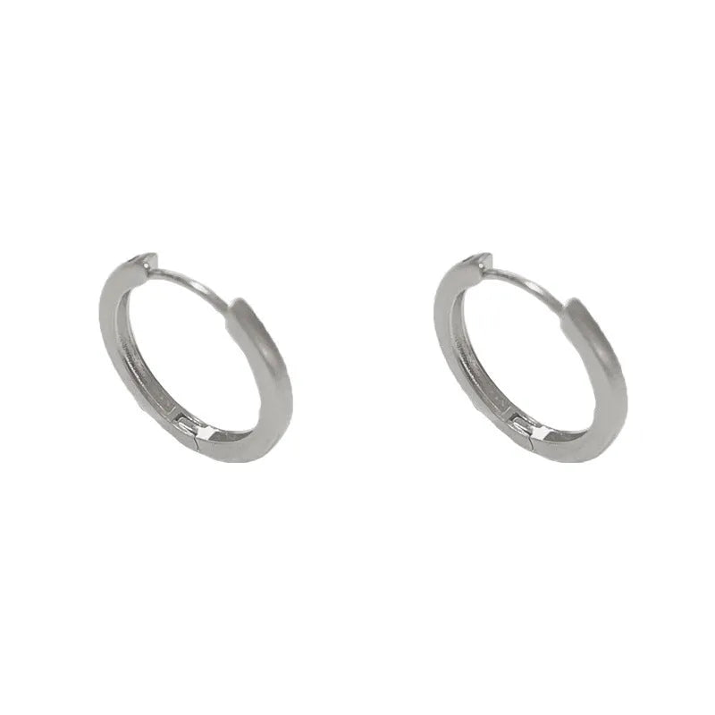 Geometric copper ear clip with round eyelet design in gold plating for women