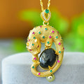 Natural Hetian gray jade pendant with copper inlay detailing showing ink blue jadeware patterning