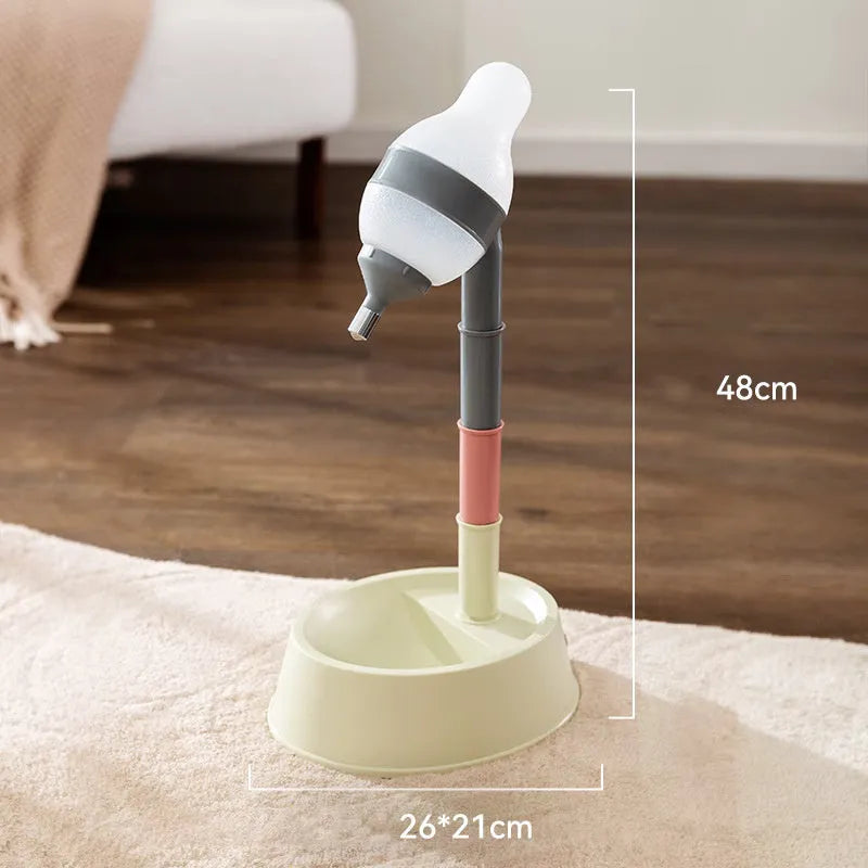 Green adjustable pet water dispenser with detachable pole and bowl on a table.