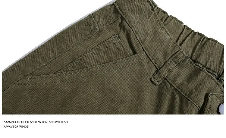 Cropped wide-leg workwear-style shorts in apricot, red, or army green with an elastic mid waistband.