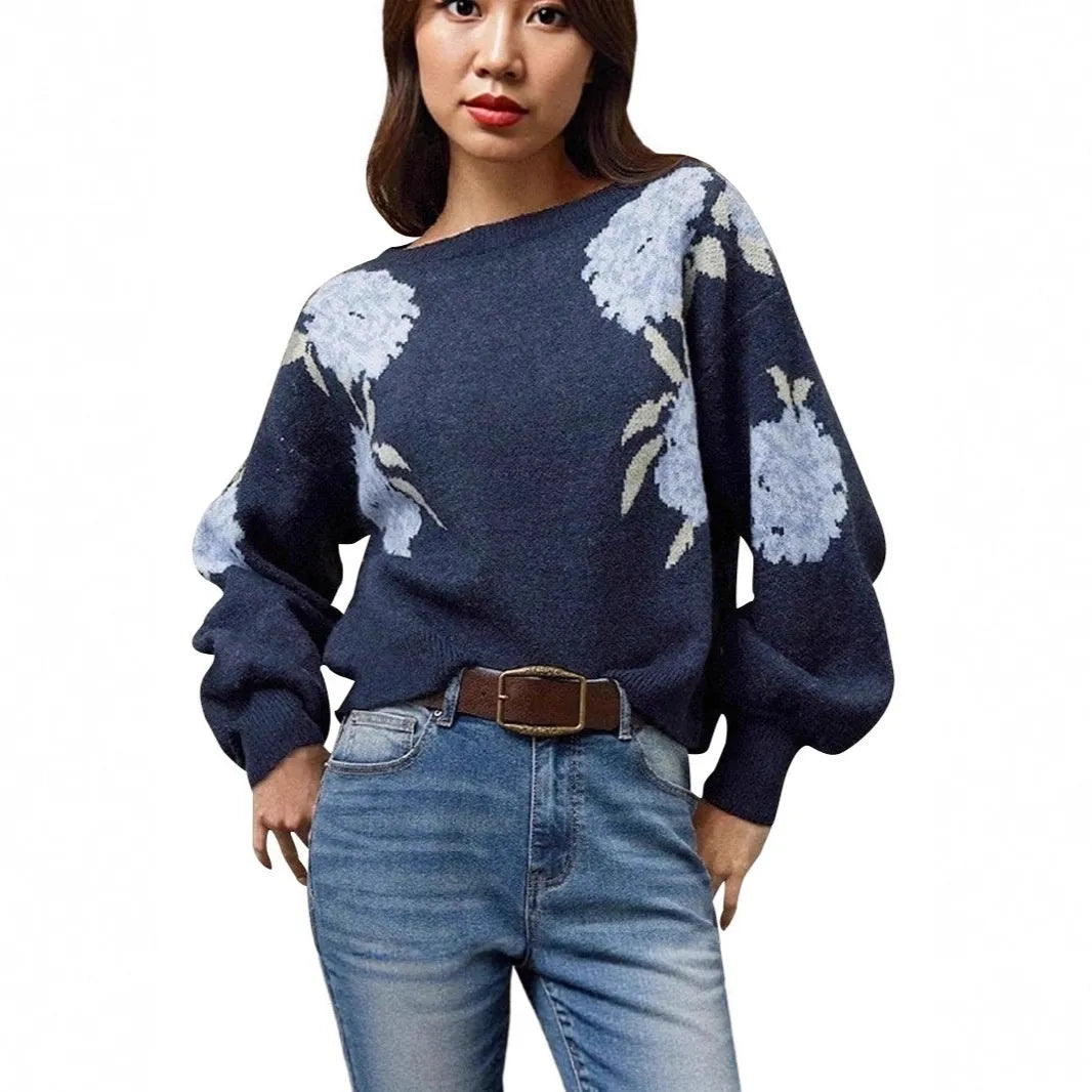 Sapphire blue women's loose pullover sweater with a detailed woven floral jacquard pattern and off-neck design.