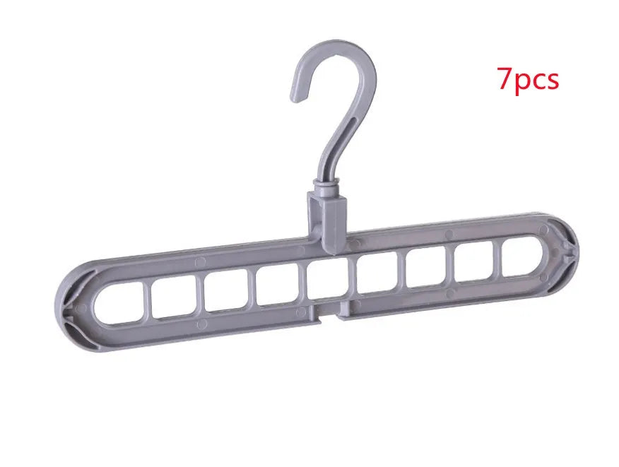 Plastic clothes hanger with rotating hook in pink colour