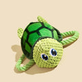 Turtle-shaped plush dog chew toy with rope core in grey, green and orange colour options