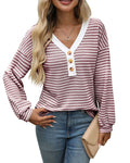 Women's loose fit V-neck pullover top with long sleeves and patchwork detail in a colour selection.