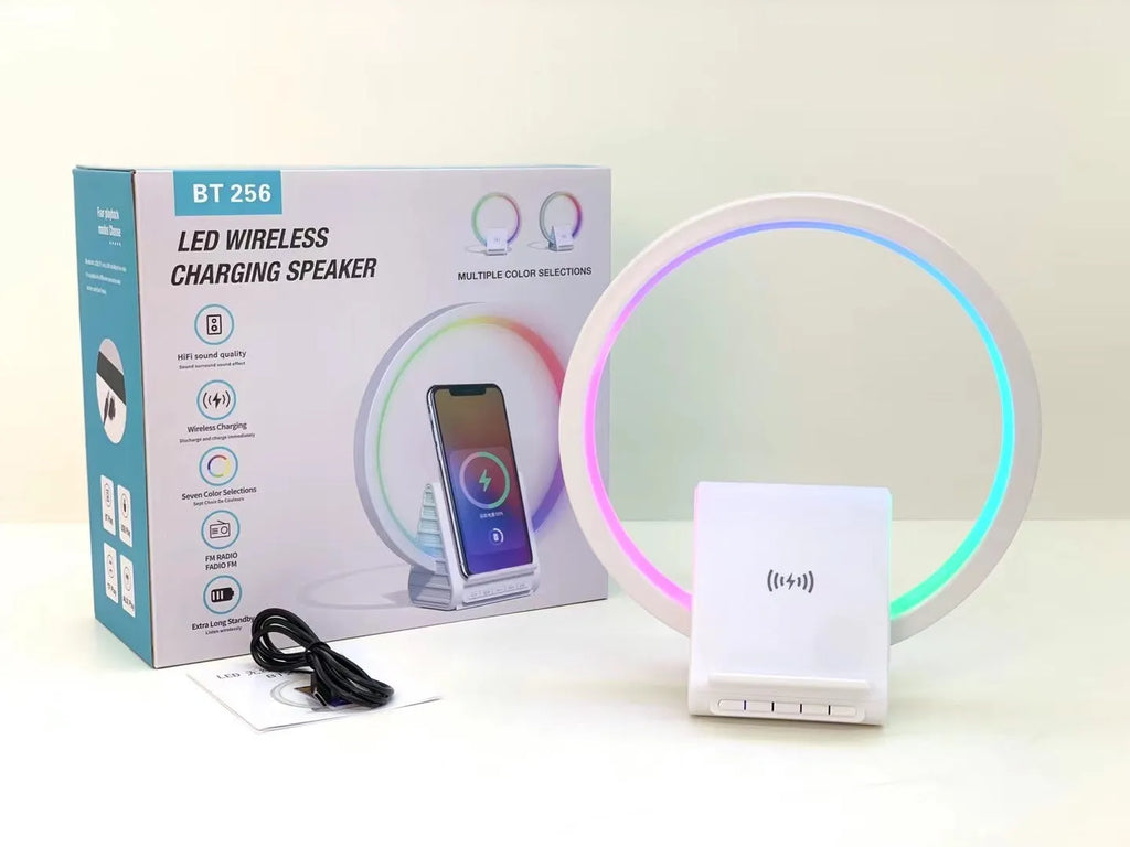 White rectangular Bluetooth speaker with wireless charging top and slim 10mm profile