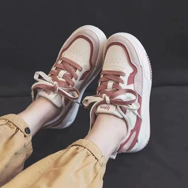 Women's low-top rubber sole sneakers in pink and white with height increase function
