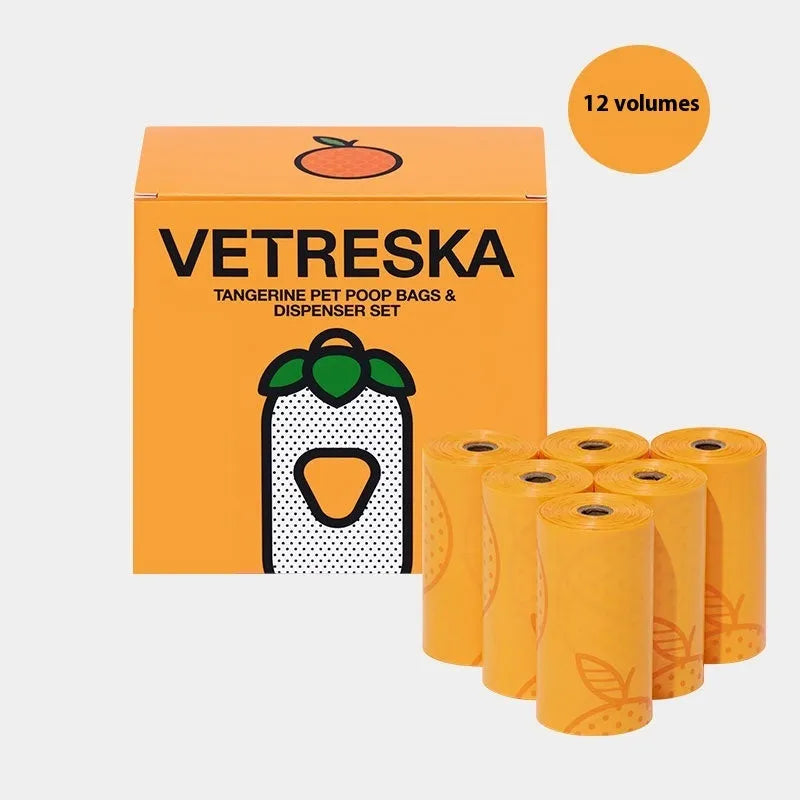 Portable plastic capsule dispenser for scented dog poo bags in strawberry, orange, and cherry blossom designs.